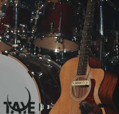 photo of guitar and drums