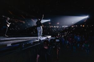 backline rentals with man ON-Stage with hand up