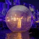 immersive VIP experiences with a person in a large transparent ball walking on water
