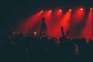 dramatic concert lighting with performer on stage